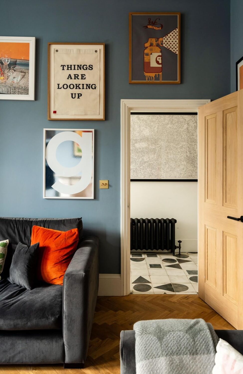 A Stunning Color Palette in an Extended Edwardian House in London 3 living room with blue wall