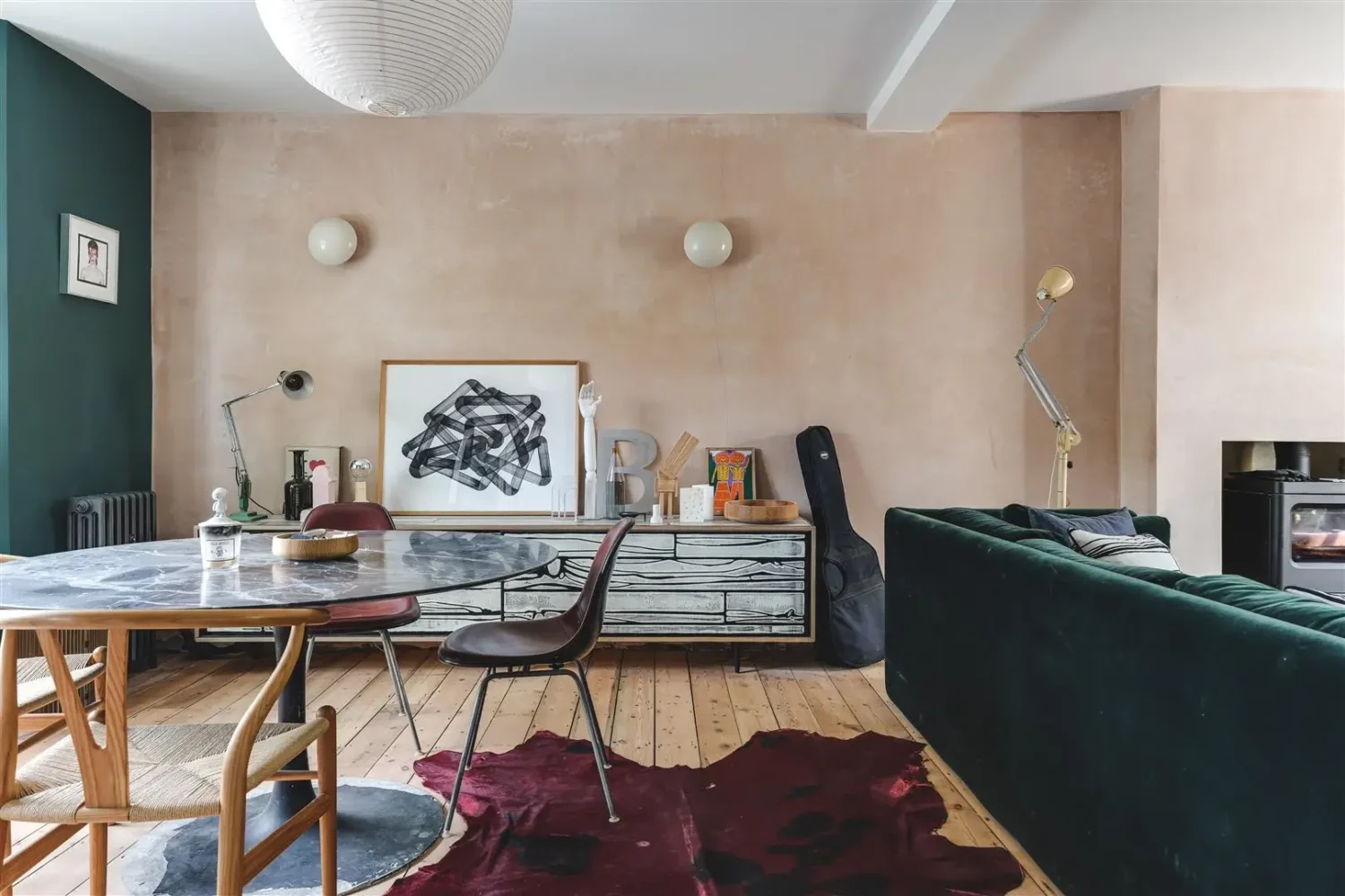 Open-Plan Rooms and Modern Furnishings in a London Home 6 living room with dining space and pink plaster wall