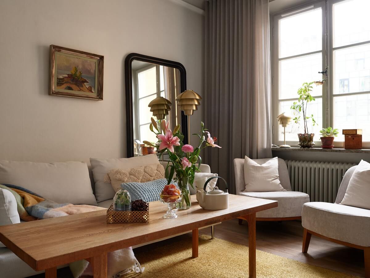 A Charming 1920s Apartment with a Green Bedroom 8 living room with floor mirror
