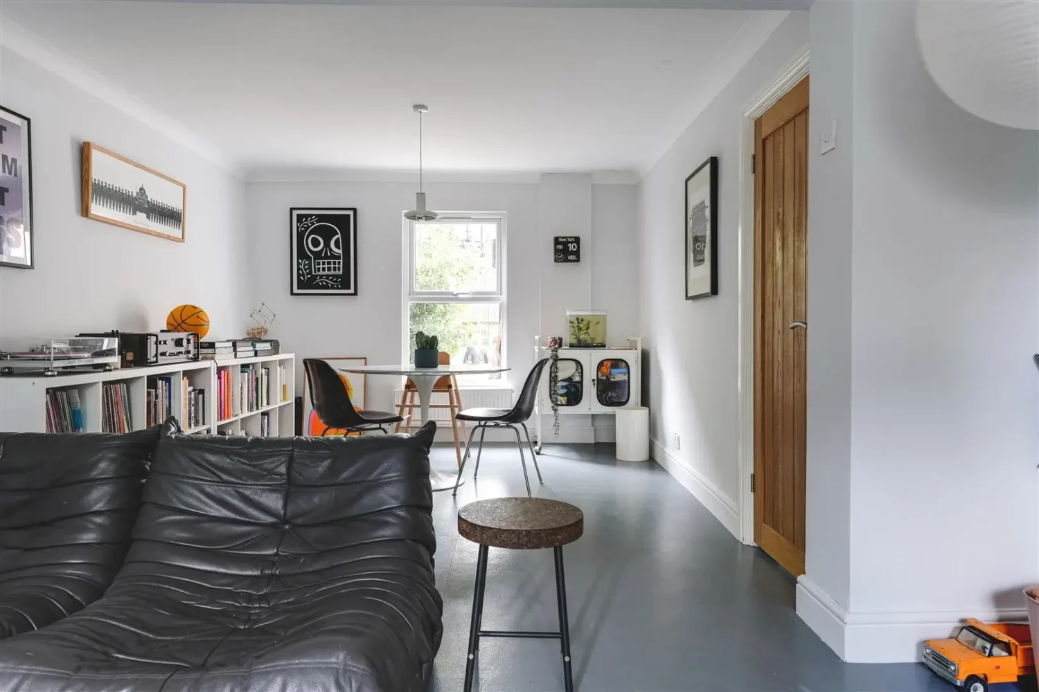Open-Plan Rooms and Modern Furnishings in a London Home 10 living room with gray painted floorboards