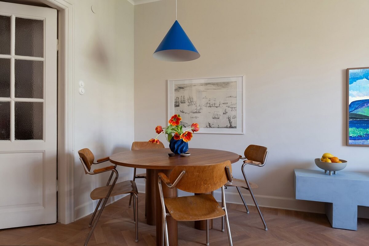 A Renovated Stockholm Apartment with Subtle Color Details 6 living room with round dining table