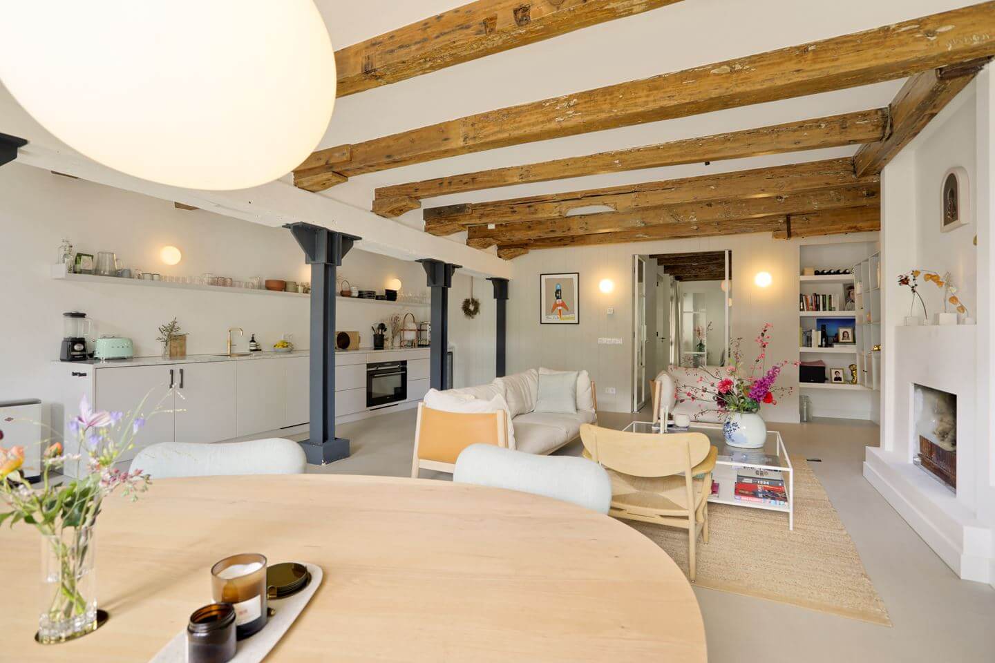 A Modern Apartment in a 17th Century Canal House in Amsterdam 8 living room wooden beams
