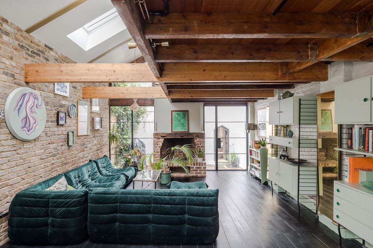 living space brick wall skylights green togo sofa