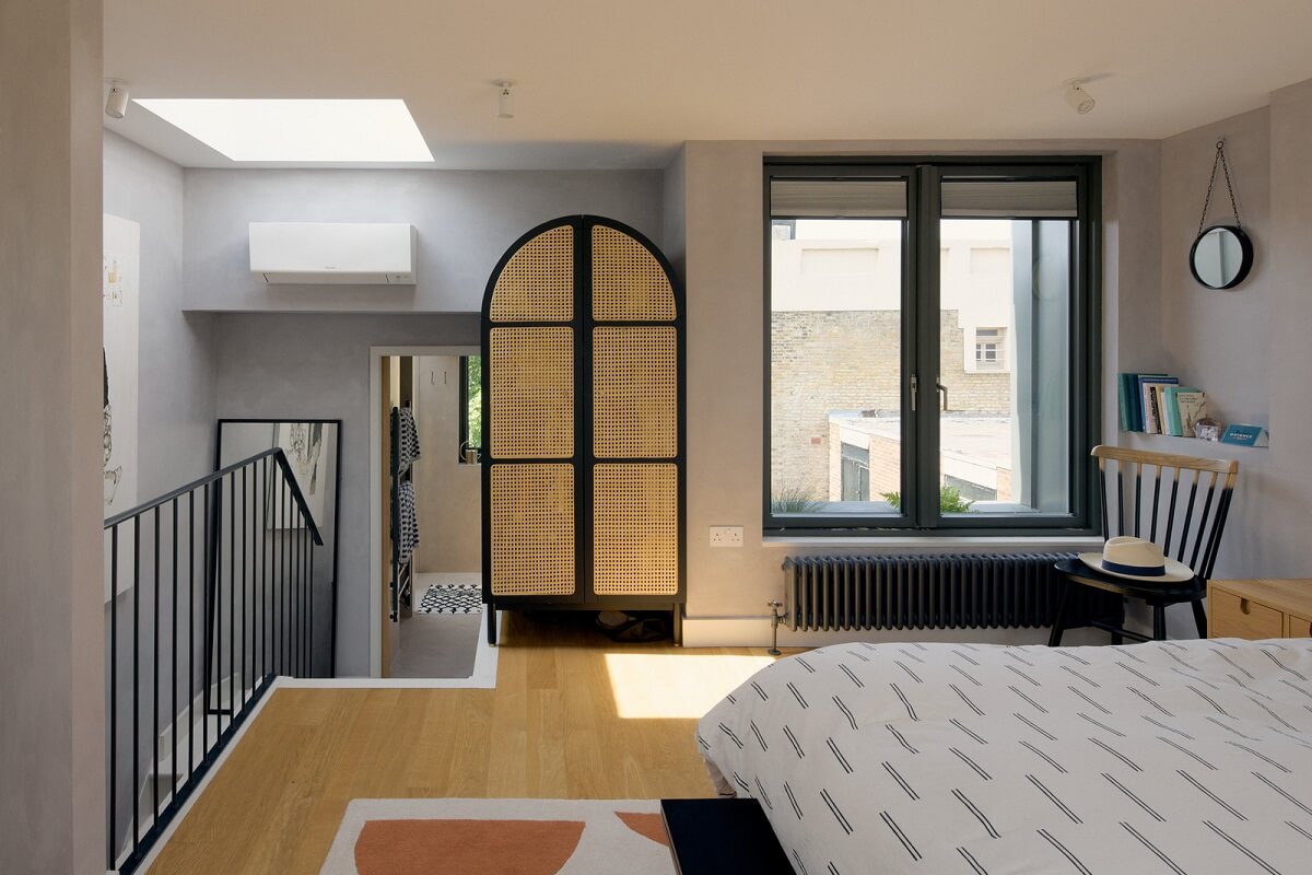Douglas Fir and Natural Materials in a London Home 23 loft bedroom with skylight