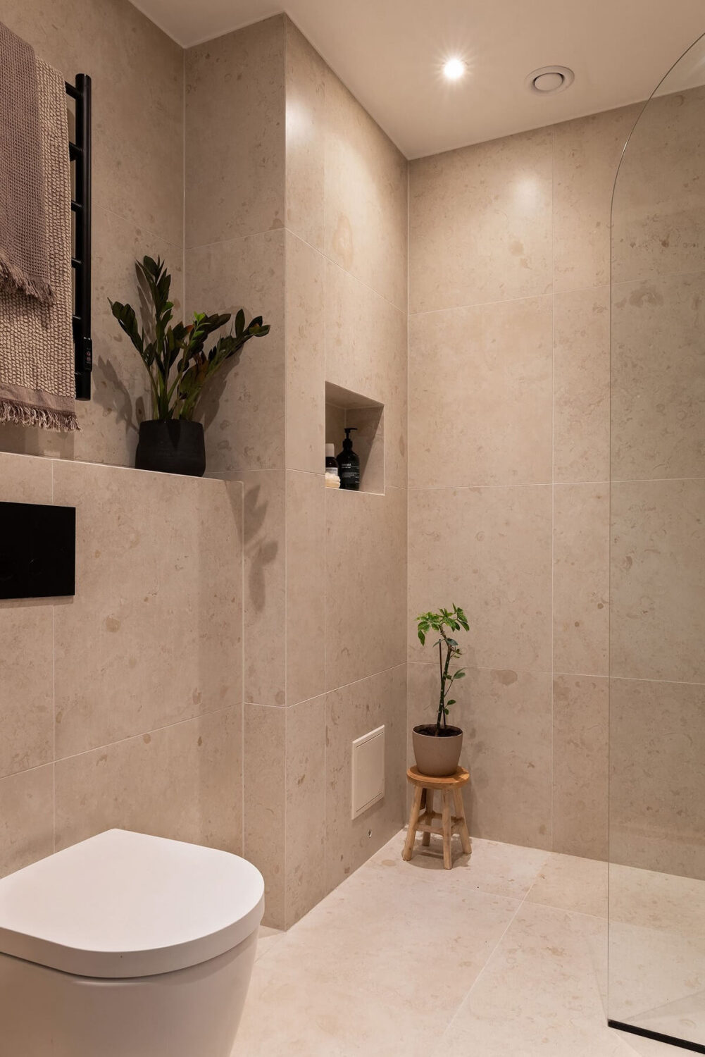 A Renovated Stockholm Apartment with Subtle Color Details 26 minimalistic bathroom