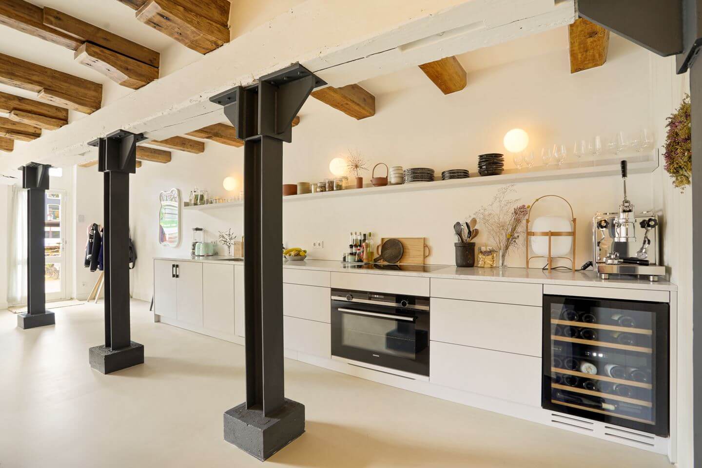 A Modern Apartment in a 17th Century Canal House in Amsterdam 2 minimalistic white kitchen