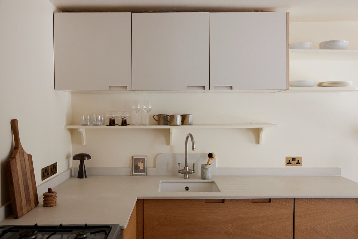 A Charming London House with an Ochre Yellow Bedroom 9 modern kitchen with cabinets and shelves