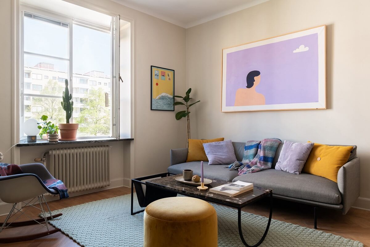 A Renovated Stockholm Apartment with Subtle Color Details 3 modern living room with colorful decor