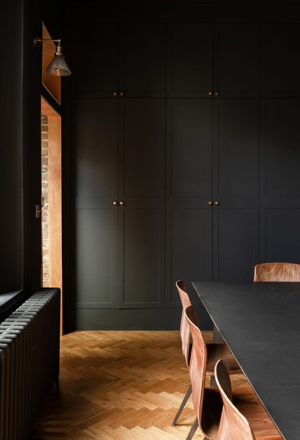 Best of 2024: Dining Rooms 11 moody dark dining room with built in storage