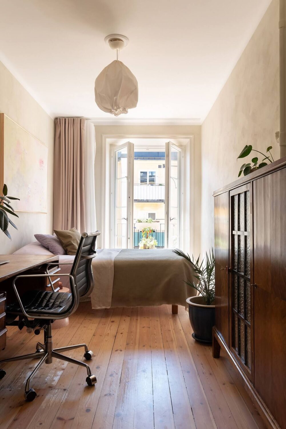 A Renovated Stockholm Apartment with Subtle Color Details 16 narrow bedroom with desk