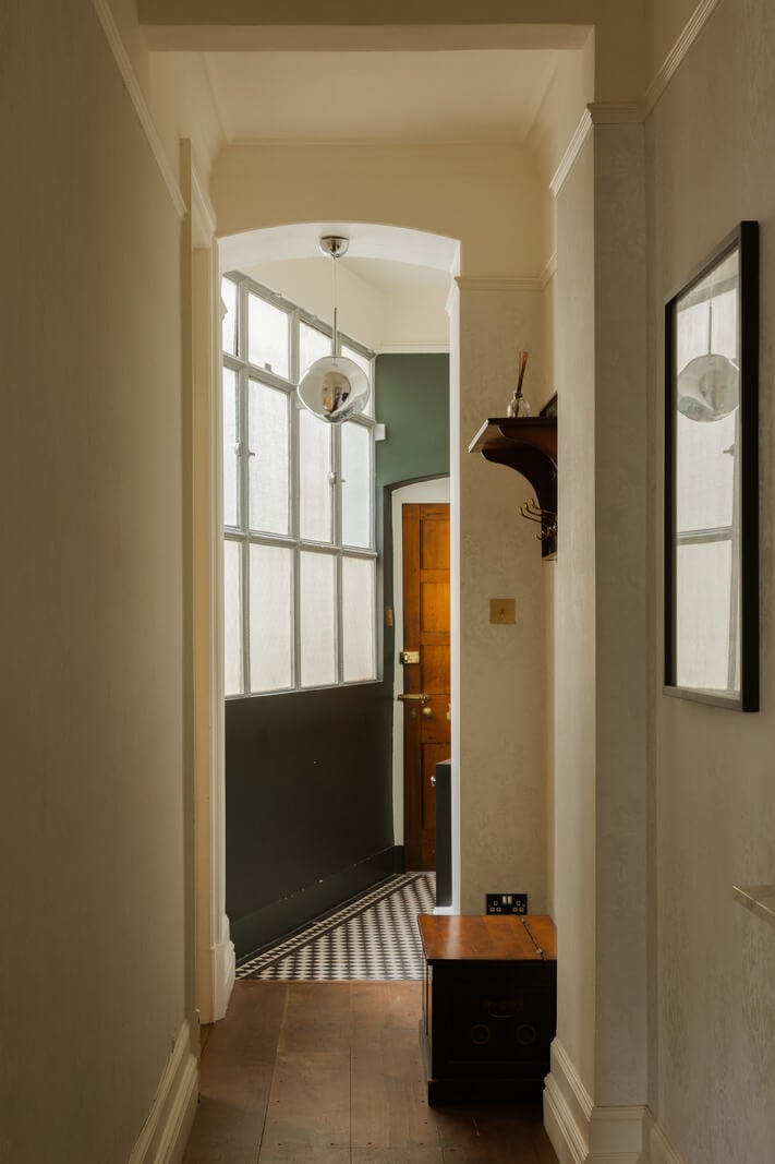 A Stylish Apartment in the Heart of London's Whitehall 16 narrow hallway green walls