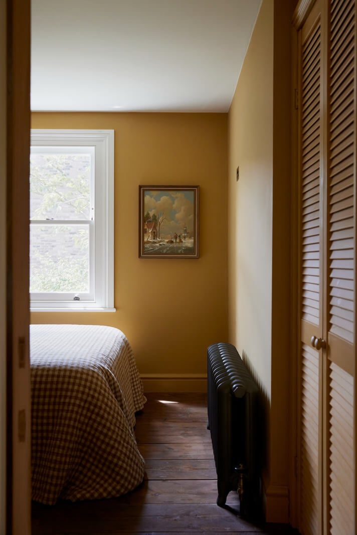 A Charming London House with an Ochre Yellow Bedroom 16 ochre yellow walls bedroom