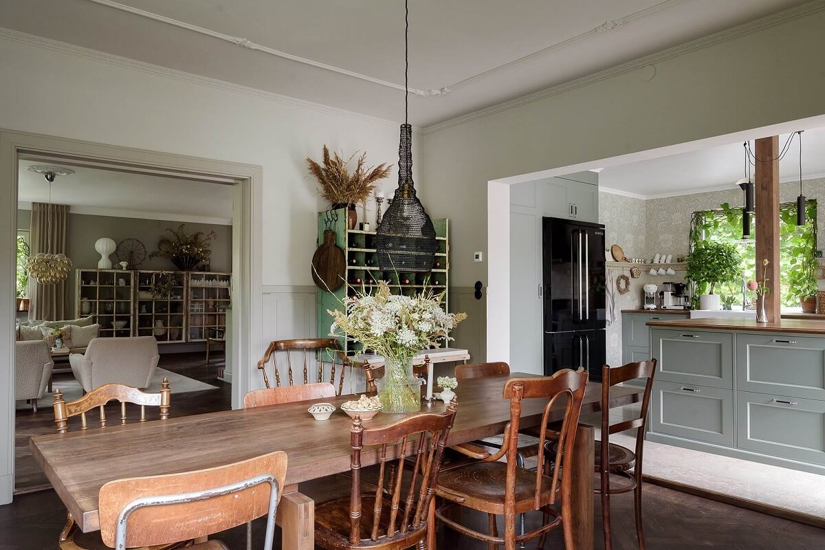 A Beautiful Family Home in a Grand 1930s Villa in Sweden 5 open plan ground floor dining table and kitchen