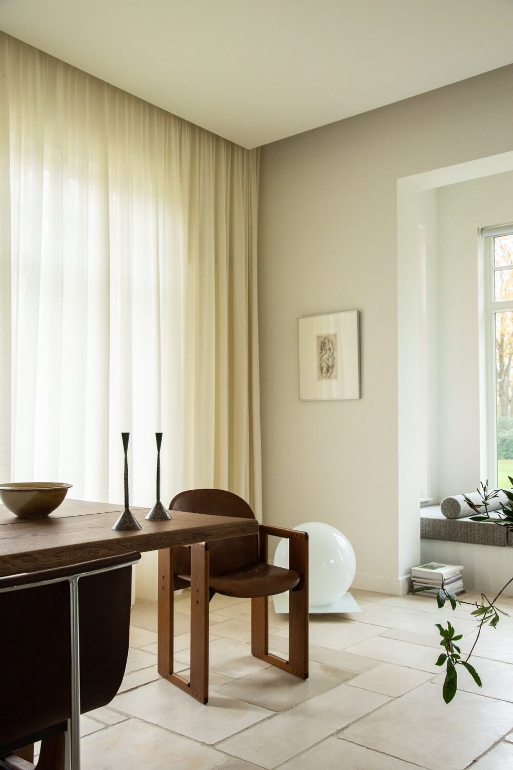 Historic Character and Timeless Elegant Interiors in a Restored Belgian Villa 6 open plan living room window seat