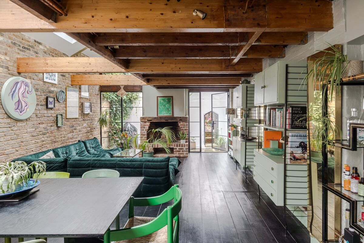 Exposed Materials and Green Tones in a London Stable Conversion 3 open plan living space exposed beams