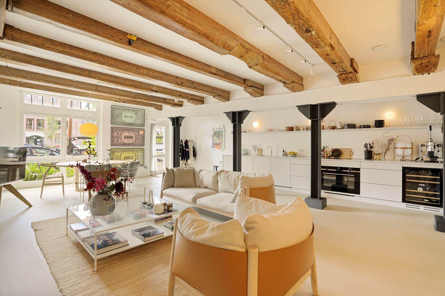 A Modern Apartment in a 17th Century Canal House in Amsterdam 1 open plan living space exposed wooden beams