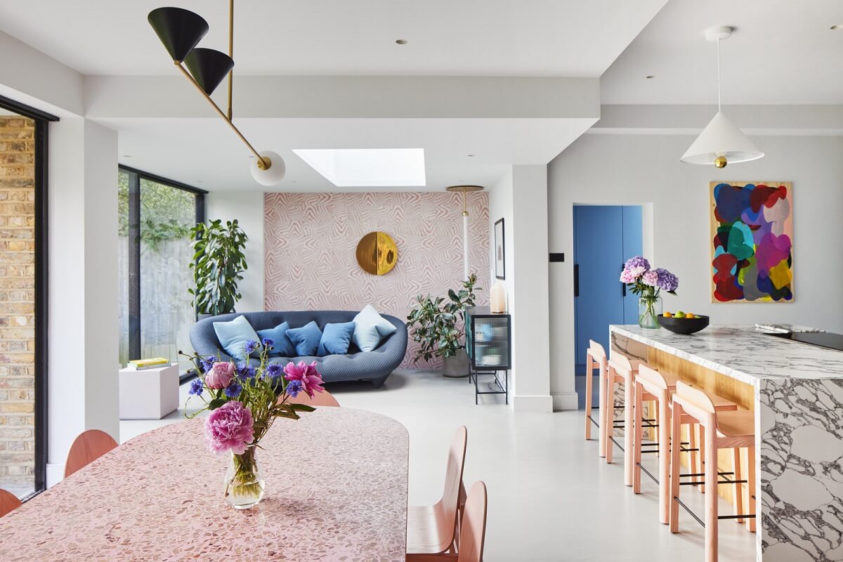 A London Family Home Decorated in Pastel Colors 4 open plan living space marble kitchen island nordroom