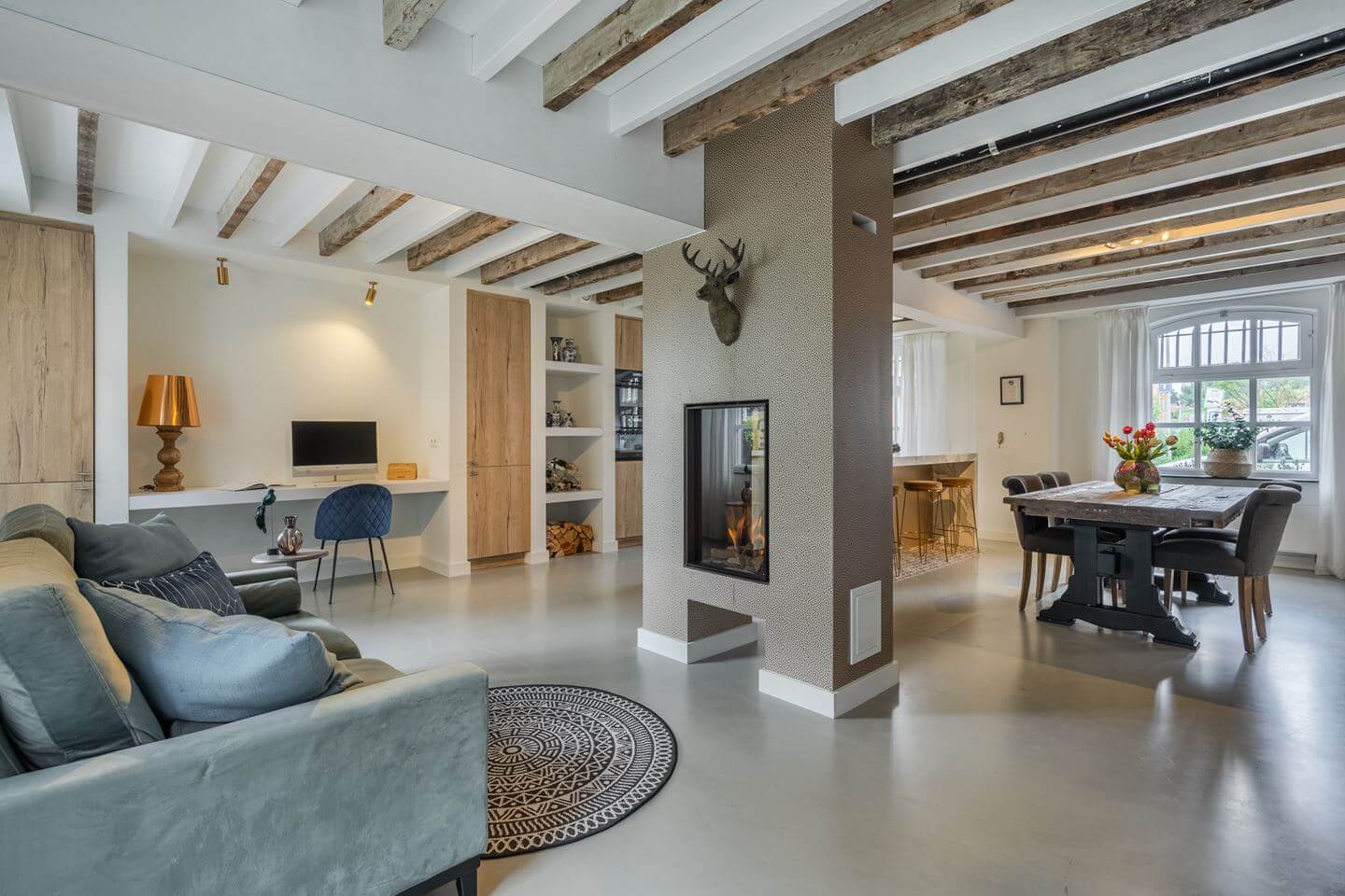 A Beautiful Loft Style Home in a Former Dutch Factory 5 open plan living space wooden beams