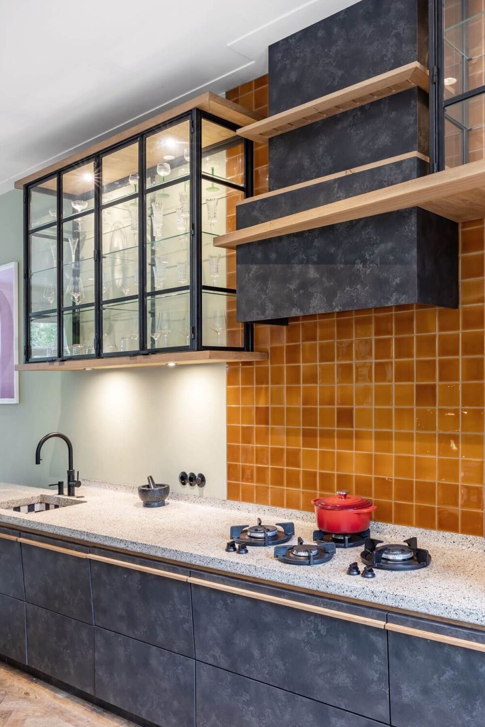 A Beautiful Renovated Duplex Apartment in Amsterdam 7 orange backsplash tiles