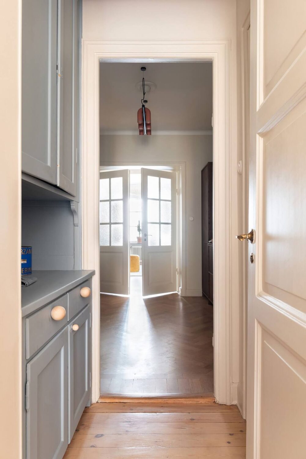 A Renovated Stockholm Apartment with Subtle Color Details 24 original built in cabinets