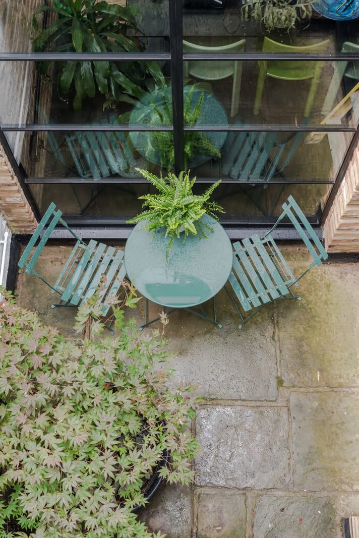 Exposed Materials and Green Tones in a London Stable Conversion 17 patio