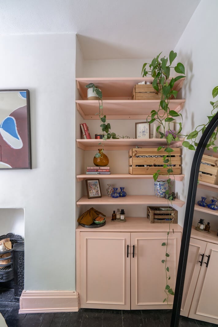 Blue Tones in a Two-Bedroom Victorian Cottage 15 pink built in cabinets and shelves