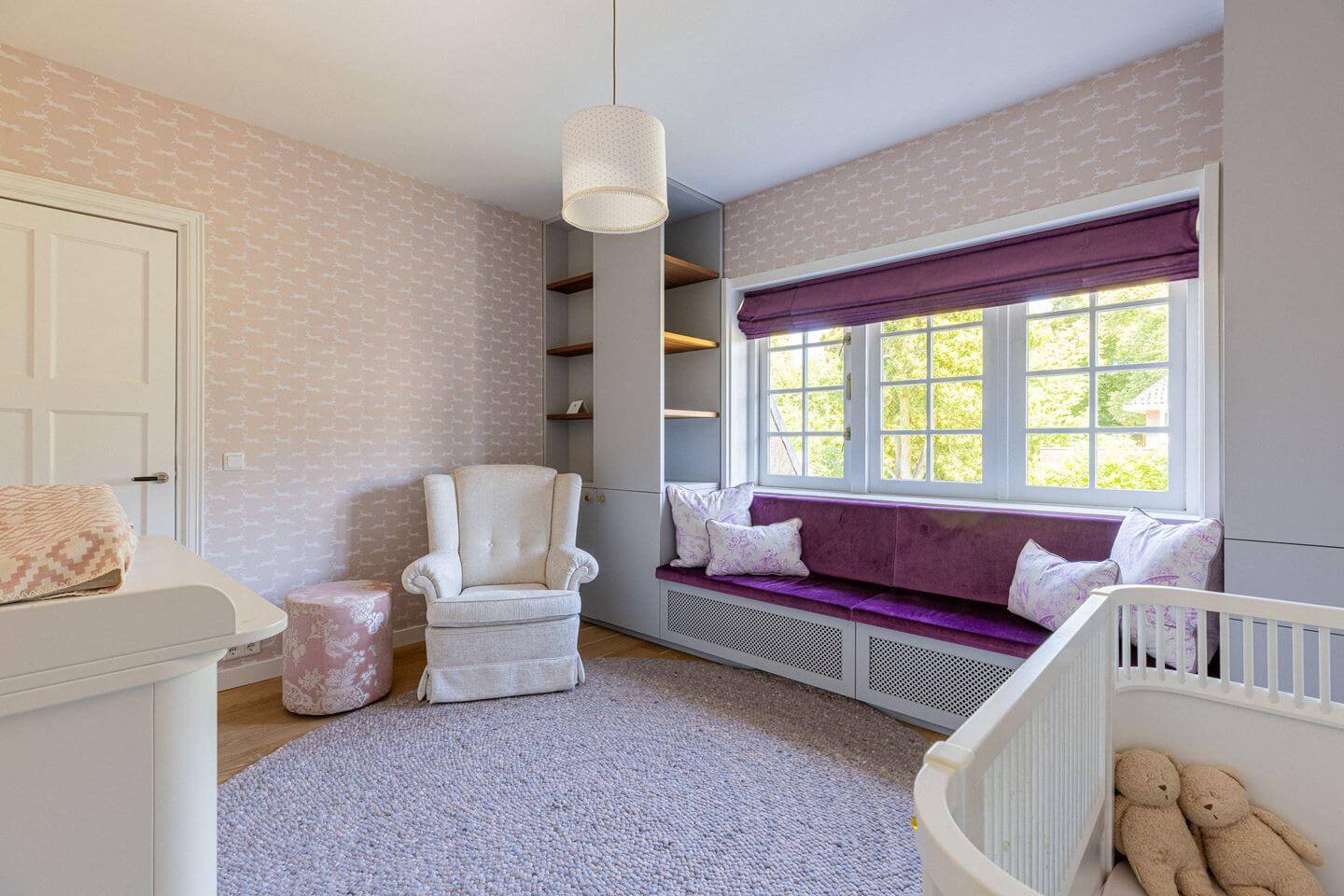 Bold Color Accents in a Dutch Family Home 19 purple window seat nursery
