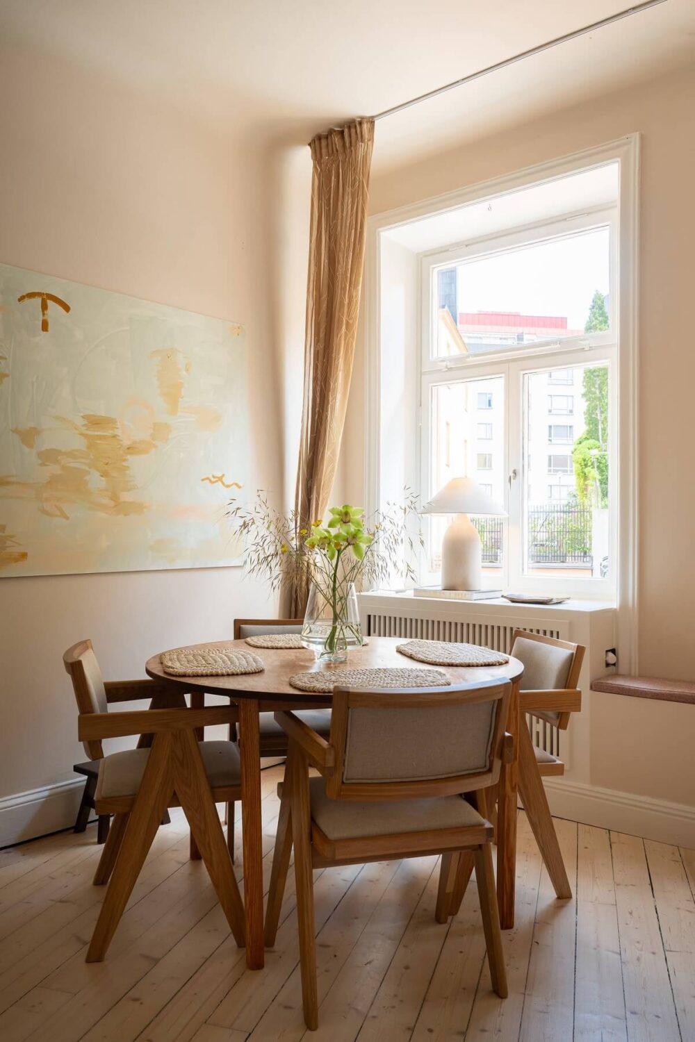 An Elegant Small Renovated Apartment in Stockholm 3 round dining table