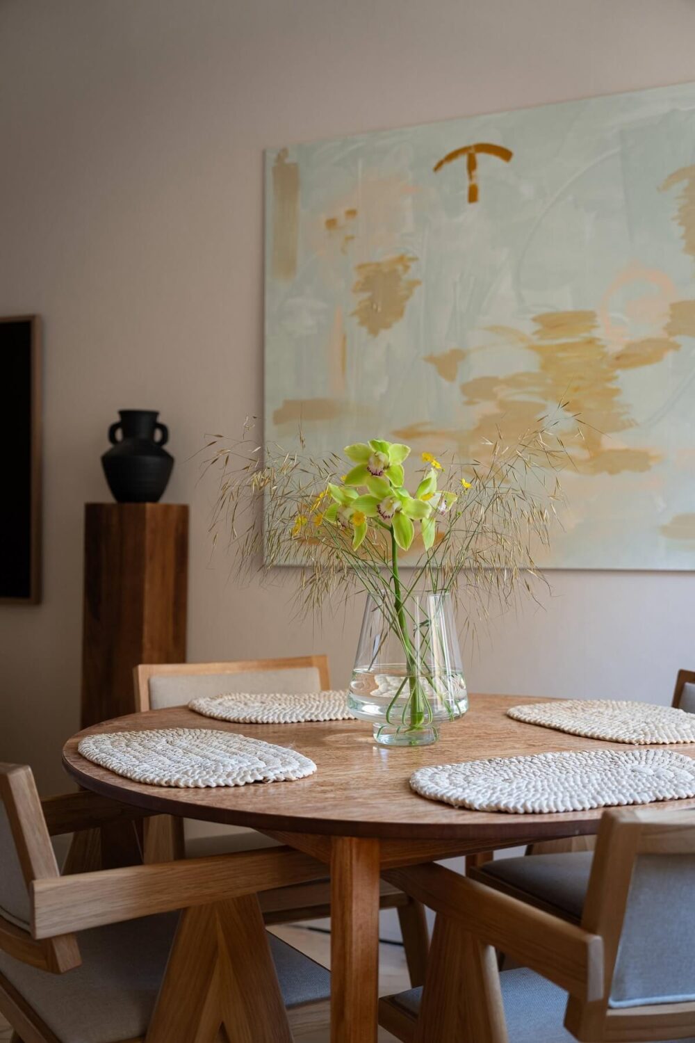 An Elegant Small Renovated Apartment in Stockholm 4 round wooden kitchen table