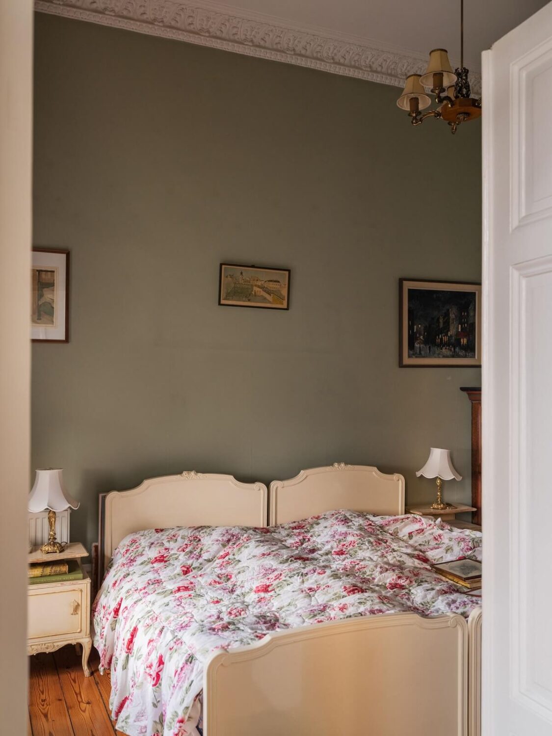 Antique Furniture and Arched Windows in a Stockholm Apartment 15 sage green bedroom with antique bed
