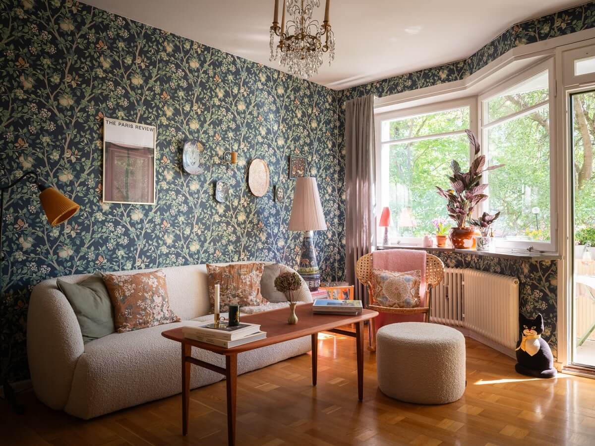 Floral Wallpaper and a Pink Kitchen in a Midcentury Apartment 3 scandinavian living room with floral wallpaper Floral Wallpaper and a Pink Kitchen in a Midcentury Apartment