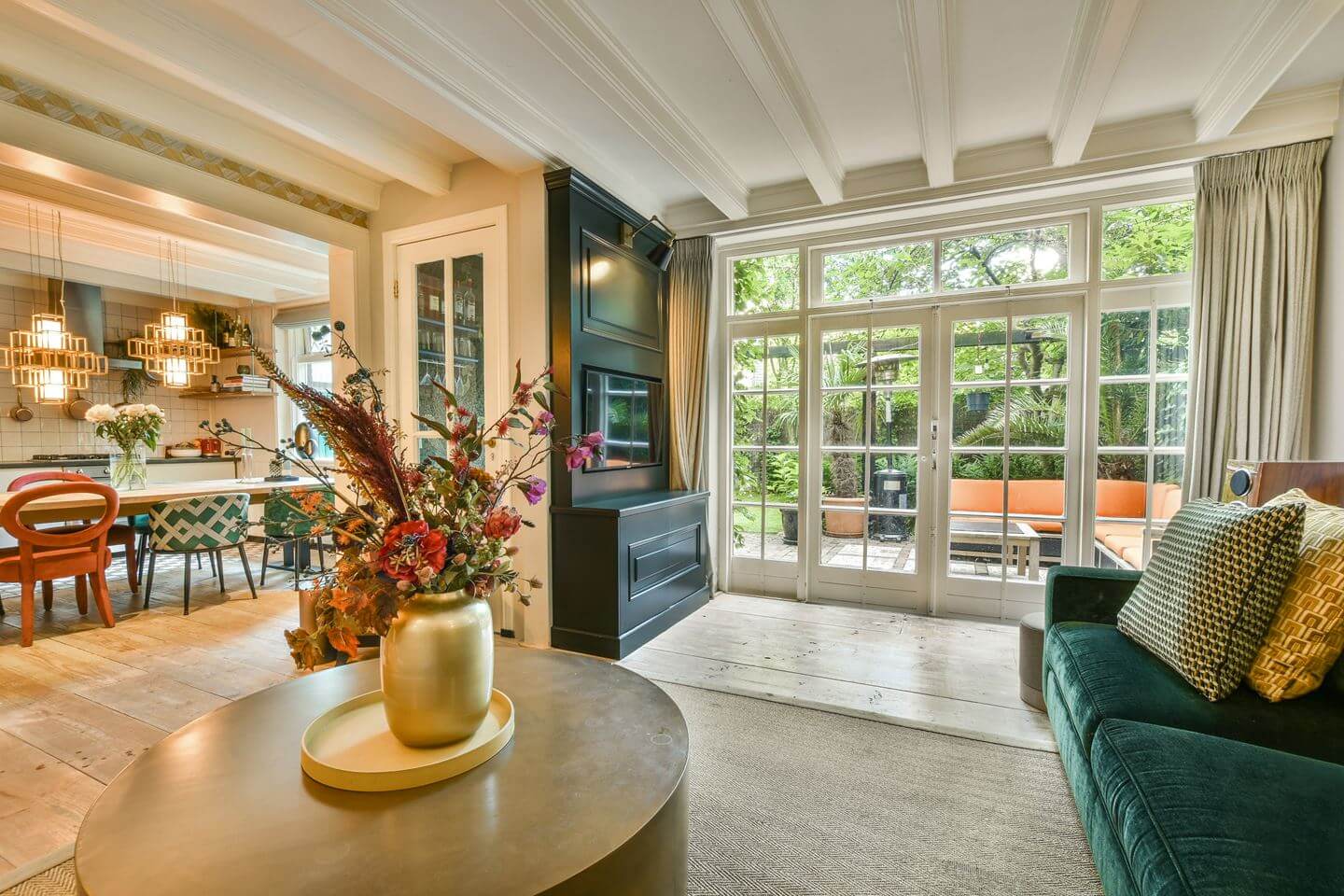 Cozy Country Style in an Amsterdam Family Townhouse 2 sitting room green sofa