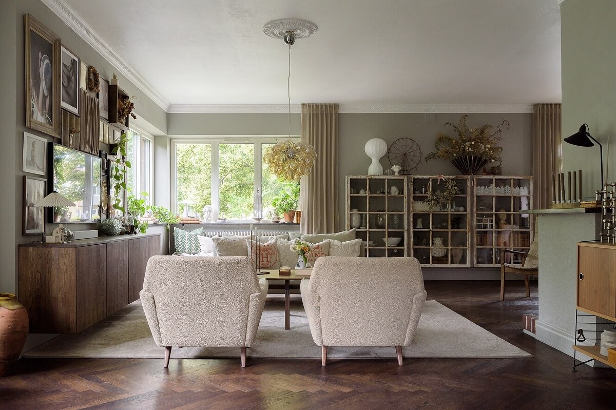 A Beautiful Family Home in a Grand 1930s Villa in Sweden 8 sitting room with dark stained herringbone floor nordroom
