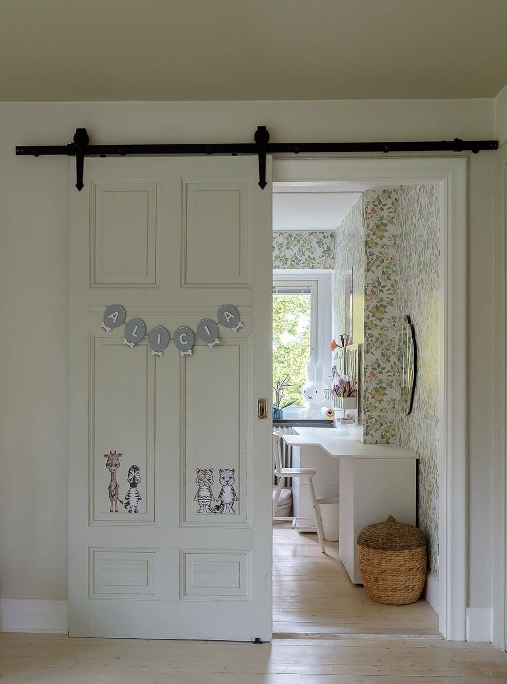 A Beautiful Family Home in a Grand 1930s Villa in Sweden 19 sliding barn door childrens bedroom