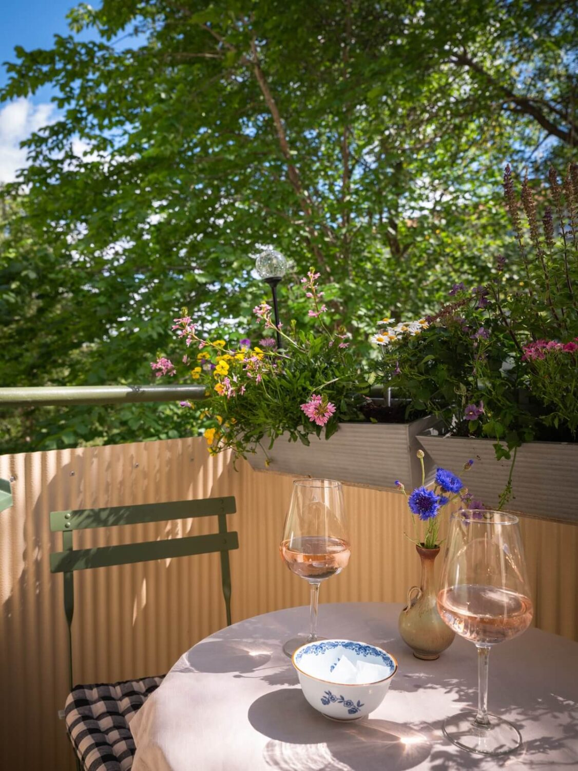 Floral Wallpaper and a Pink Kitchen in a Midcentury Apartment 6 small balcony with flower boxes