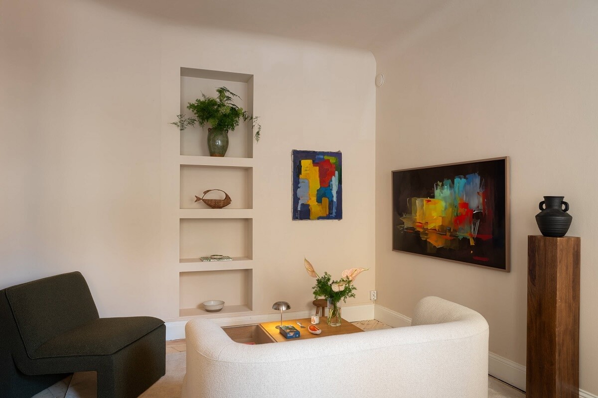 An Elegant Small Renovated Apartment in Stockholm 13 small serene living room