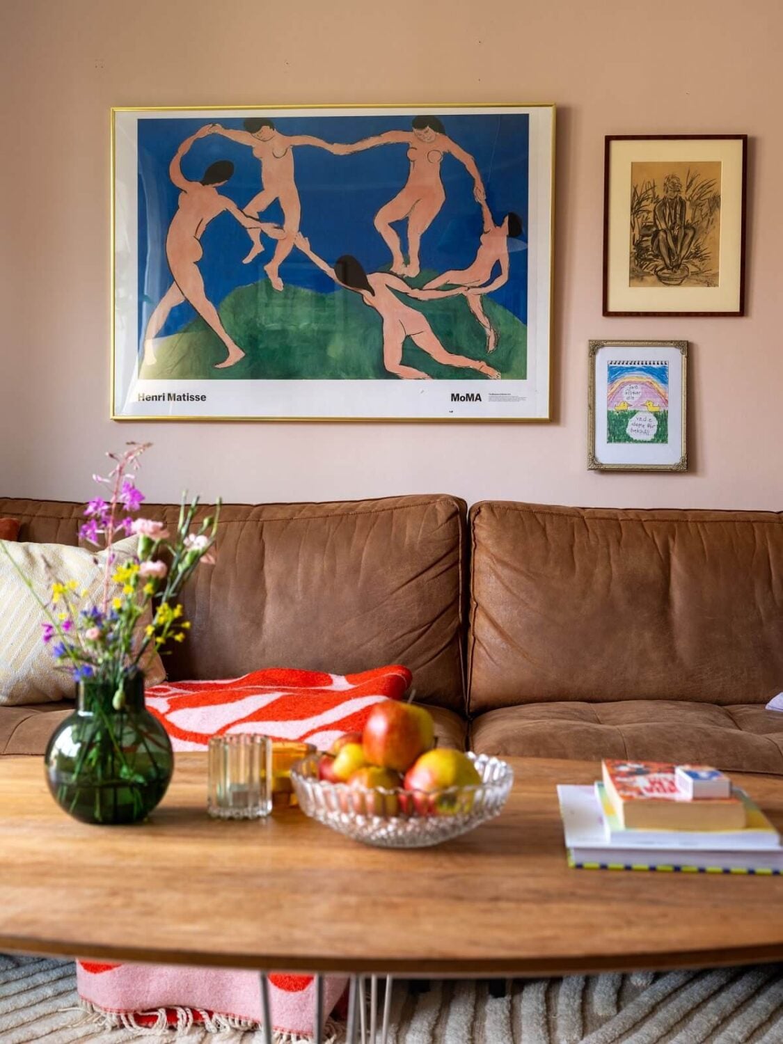 A Studio Apartment with Light Pink Walls and Vintage Furniture 6 sofa studio apartment