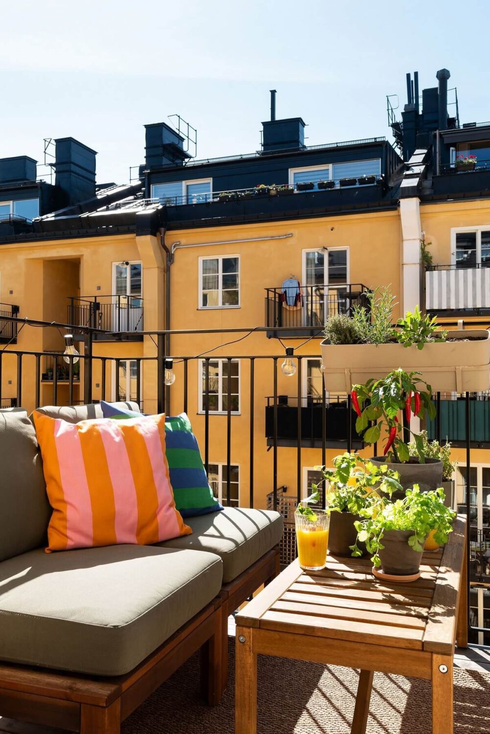 A Renovated Stockholm Apartment with Subtle Color Details 21 sunny courtyard balcony