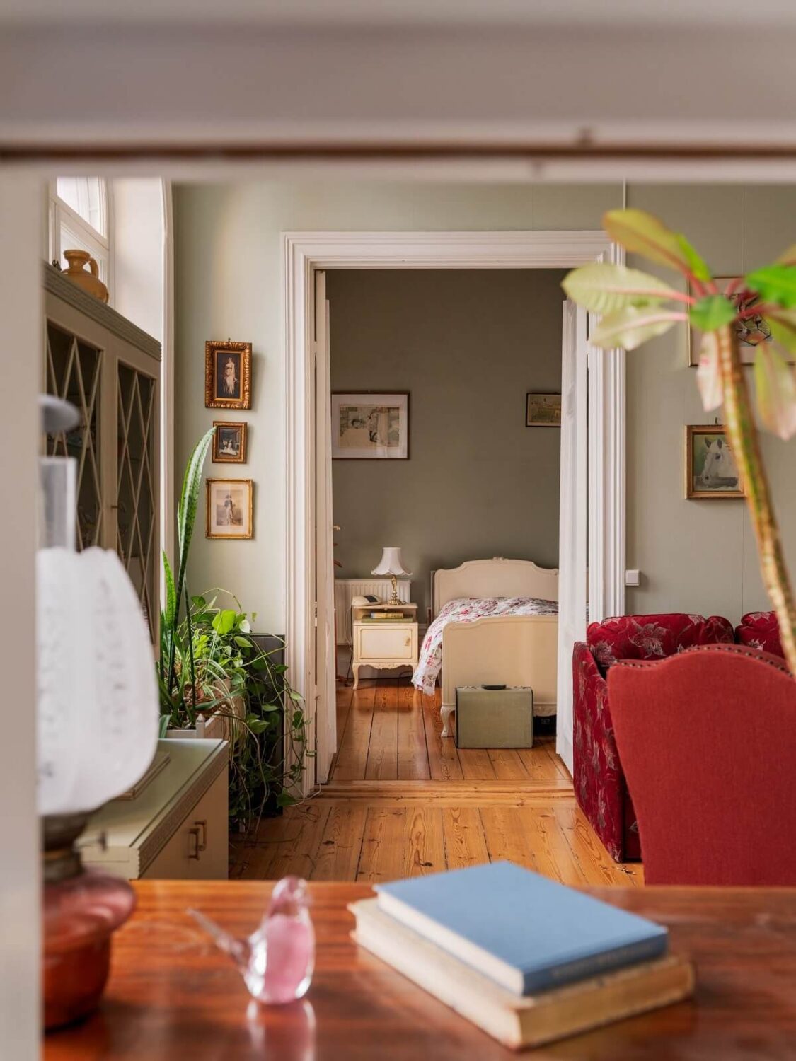 Antique Furniture and Arched Windows in a Stockholm Apartment 13 view into bedroom