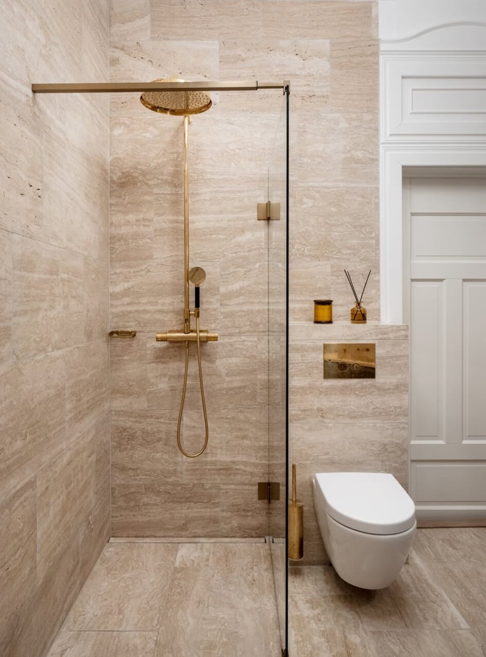 A Luxurious Stockholm Apartment with Period Features 25 walk in shower brass fittings