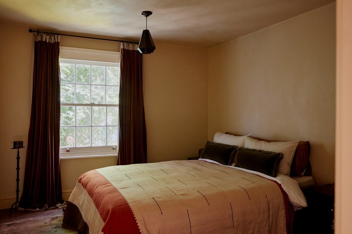 A Charming London House with an Ochre Yellow Bedroom 12 warm color accents bedroom