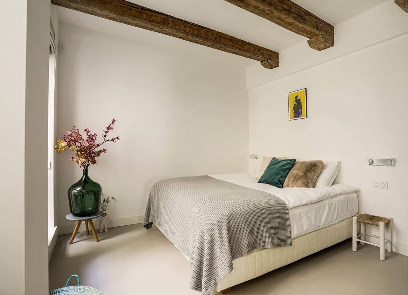 A Modern Apartment in a 17th Century Canal House in Amsterdam 10 white bedroom wooden ceiling beams