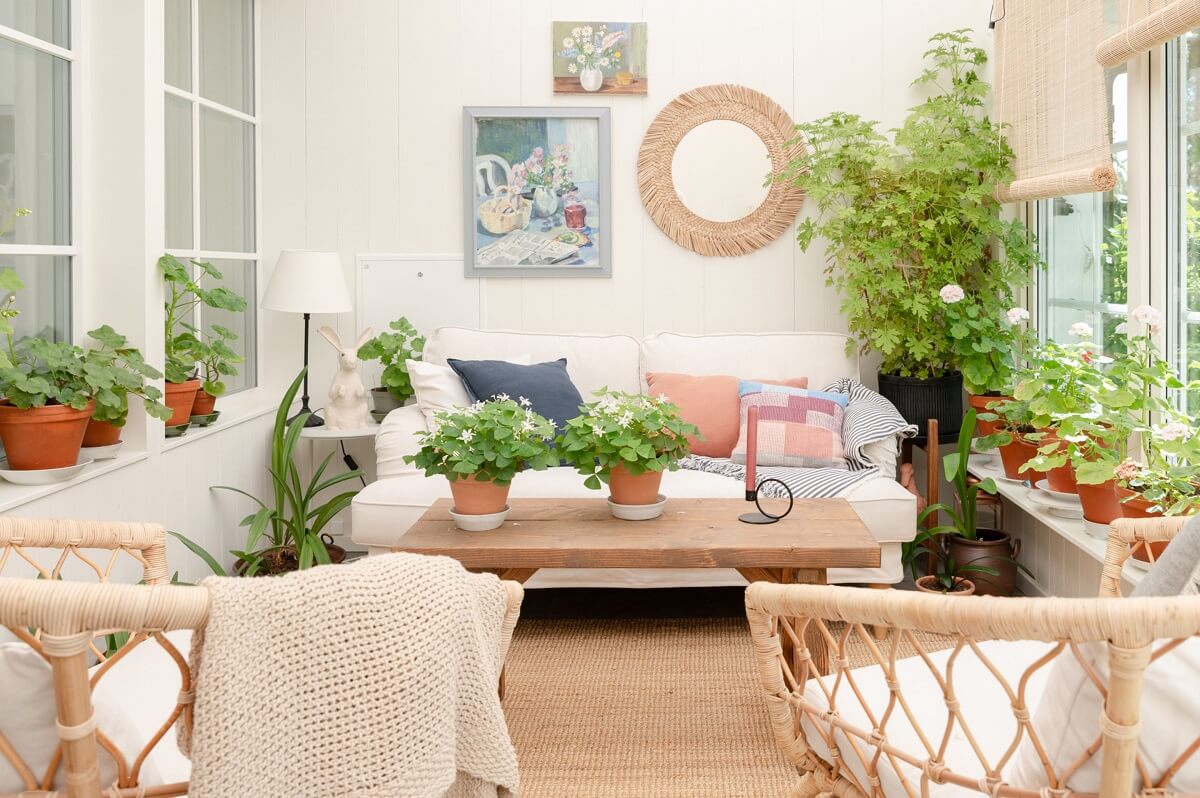 A Swedish Family Home with a Lovely Garden Room 9 white garden room with seating