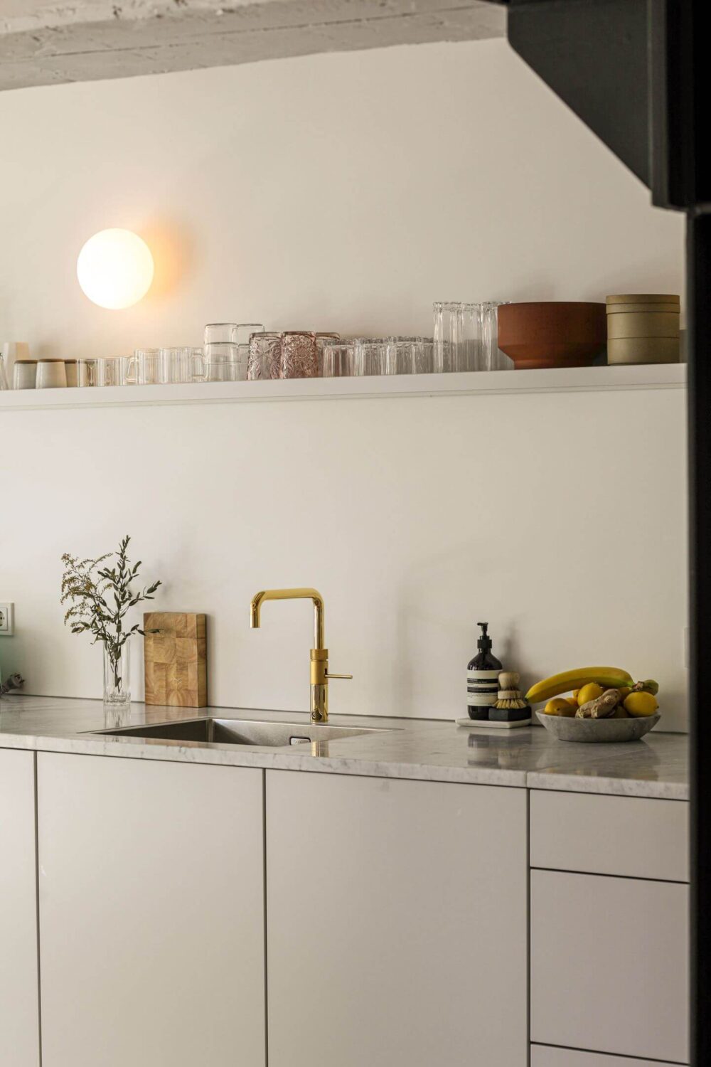 A Modern Apartment in a 17th Century Canal House in Amsterdam 3 white kitchen with shelf