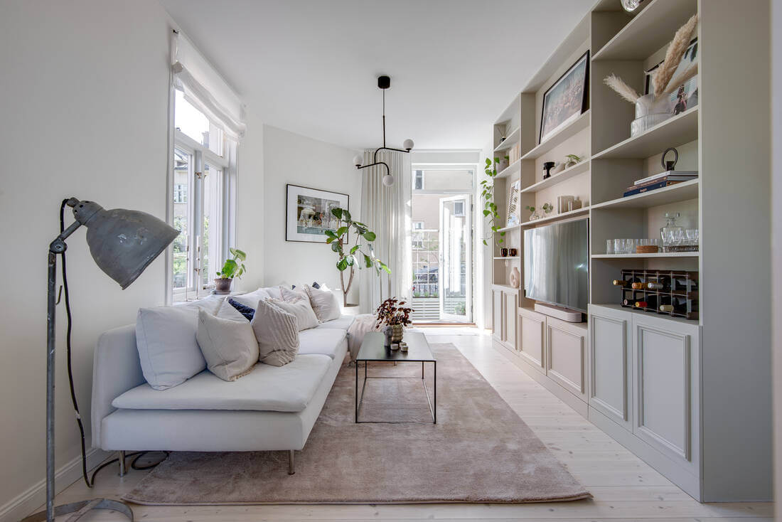 A White Apartment Features a Beautiful Terrace with a View 3 white scandinavian living room