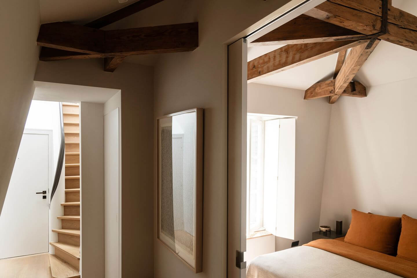 An Apartment with High Pitched Ceilings in an Amsterdam Canal House 10 wooden beams amsterdam apartment