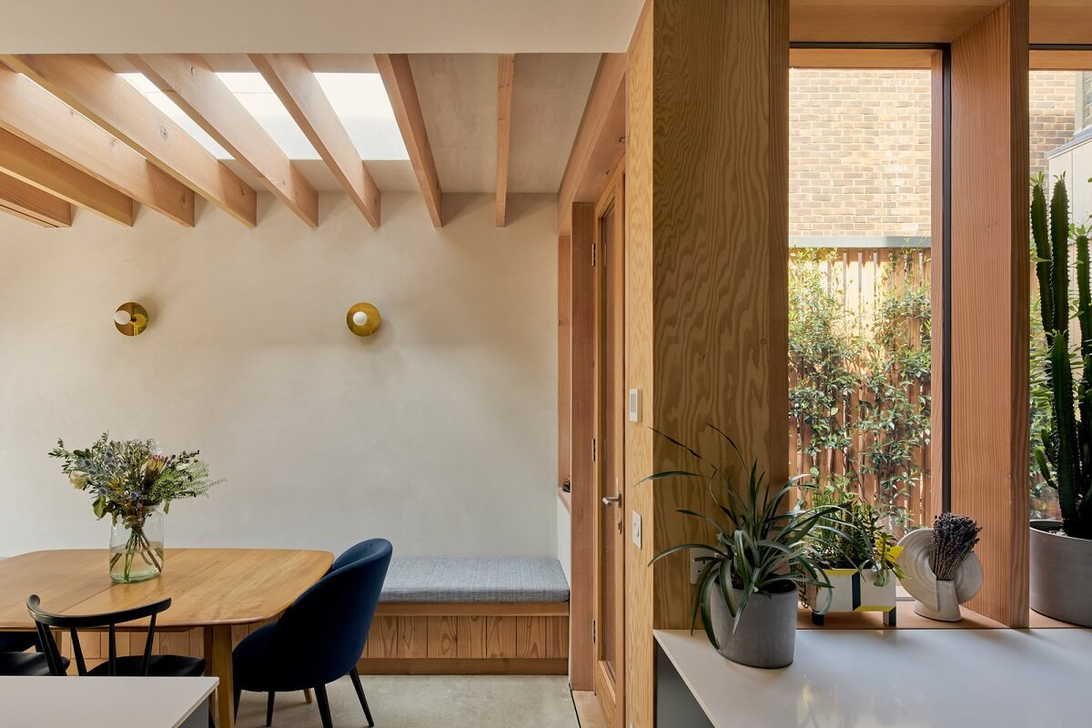 Douglas Fir and Natural Materials in a London Home 13 wooden kitchen extension with dining bench