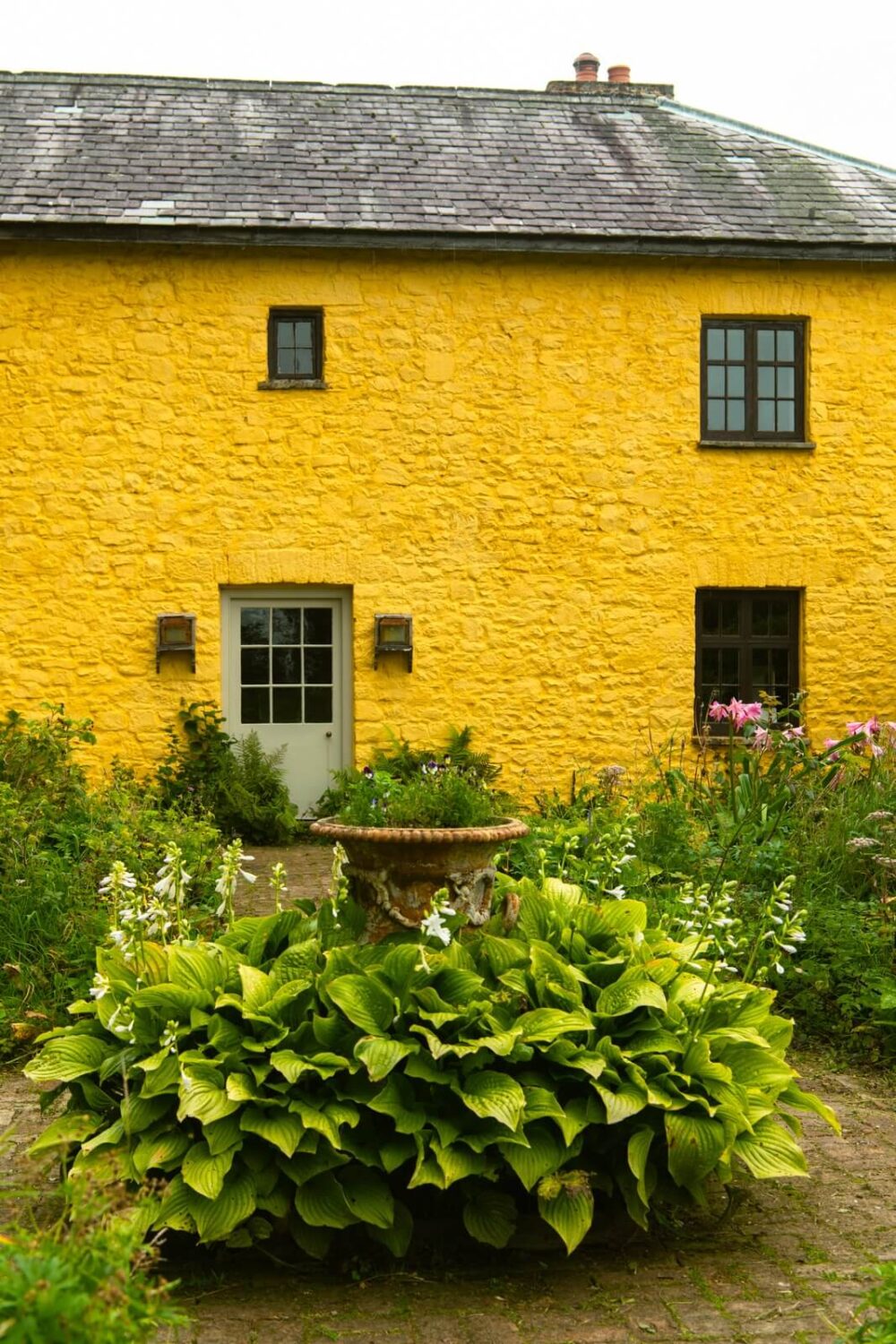 A Yellow Farmhouse with Bold Color Pops in Wales 28 yellow farmhouse A Yellow Farmhouse with Bold Color Pops in Wales