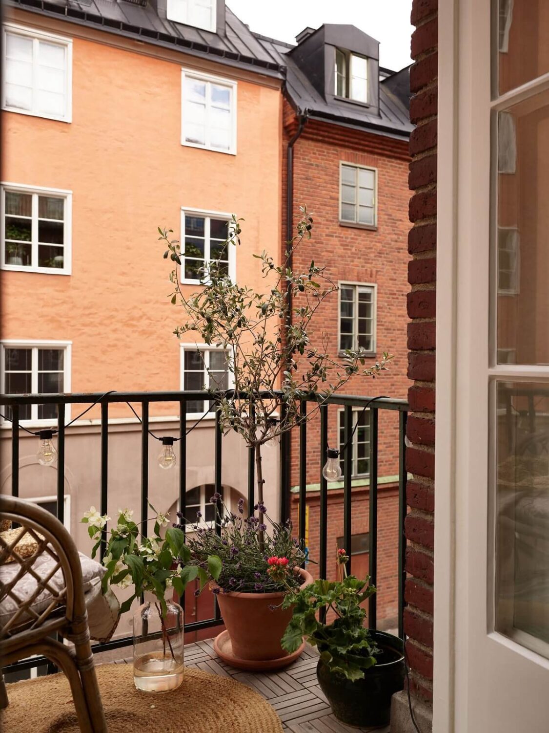 A Cozy 1920s Apartment with Original Details and Wallpaper 9 balcony
