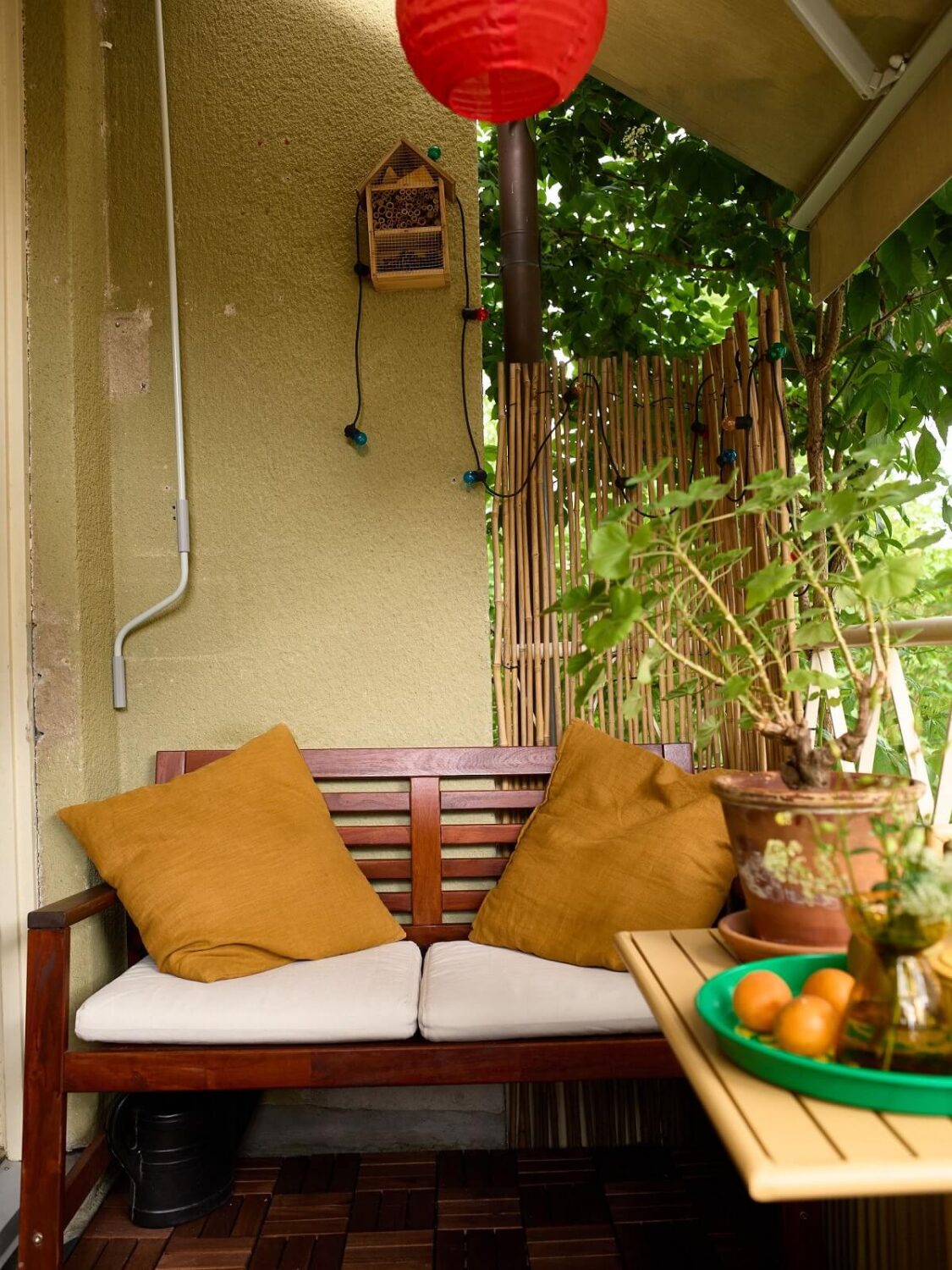 A Charming and Cozy Midcentury Family Apartment in Sweden 9 balcony with bench